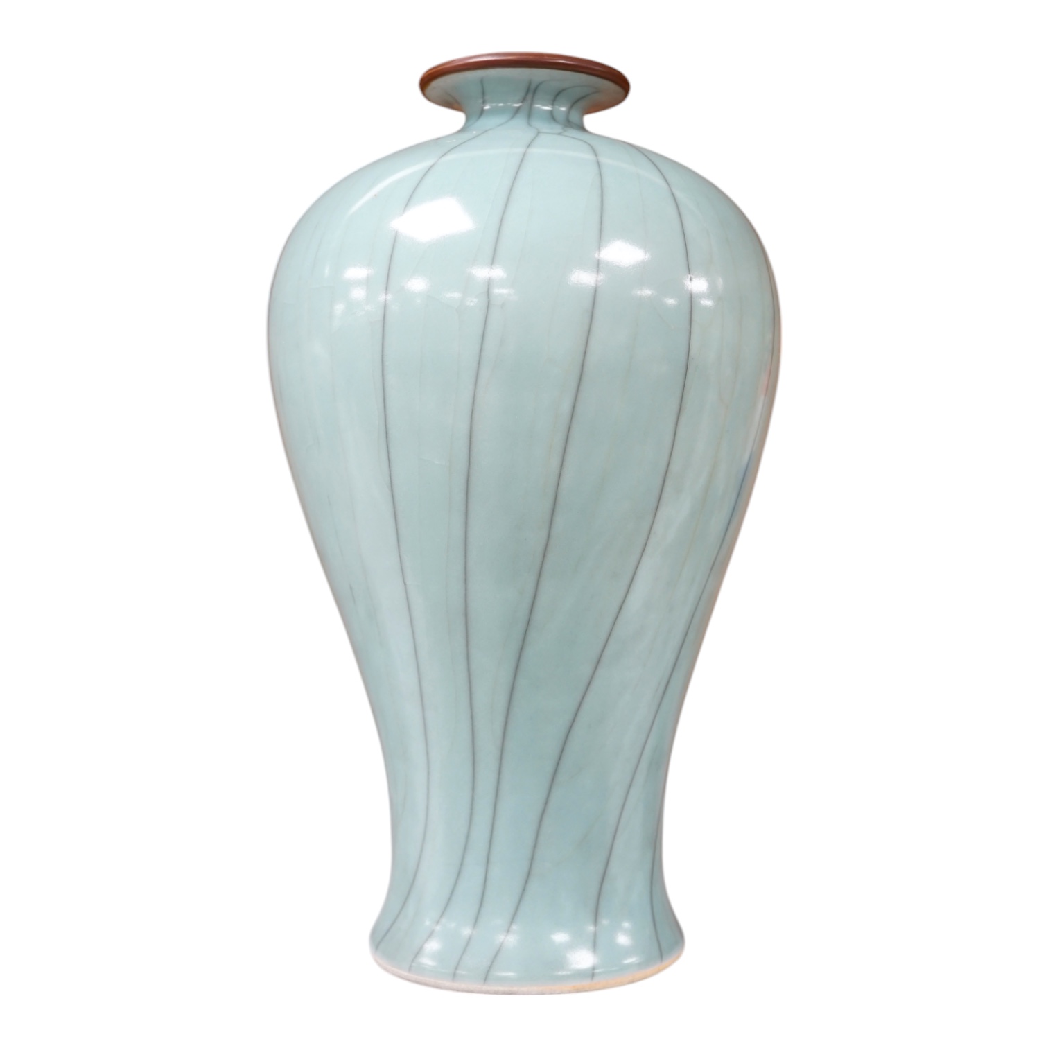 A Chinese celadon and crackle glazed pottery vase, incised mark to base, 32cm. Condition - good